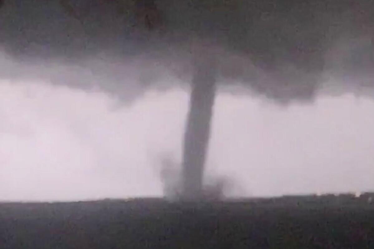 An image made from video by Twitter user @AthenaRising shows the tornado in Rockwall, Texas, on Sunday.