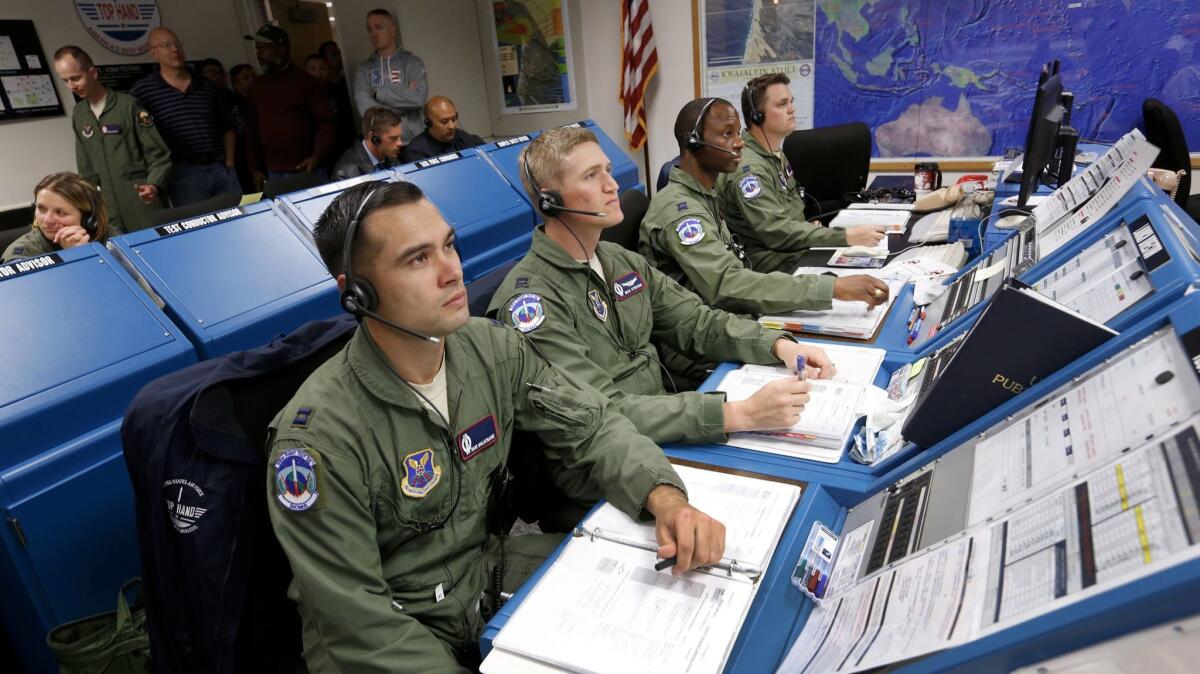 Members of the Air Force 576th Flight Test Squadron launch team for GT-222 monitor systems from the ICBM Launch Support Center at Vandenberg Air Force Base.