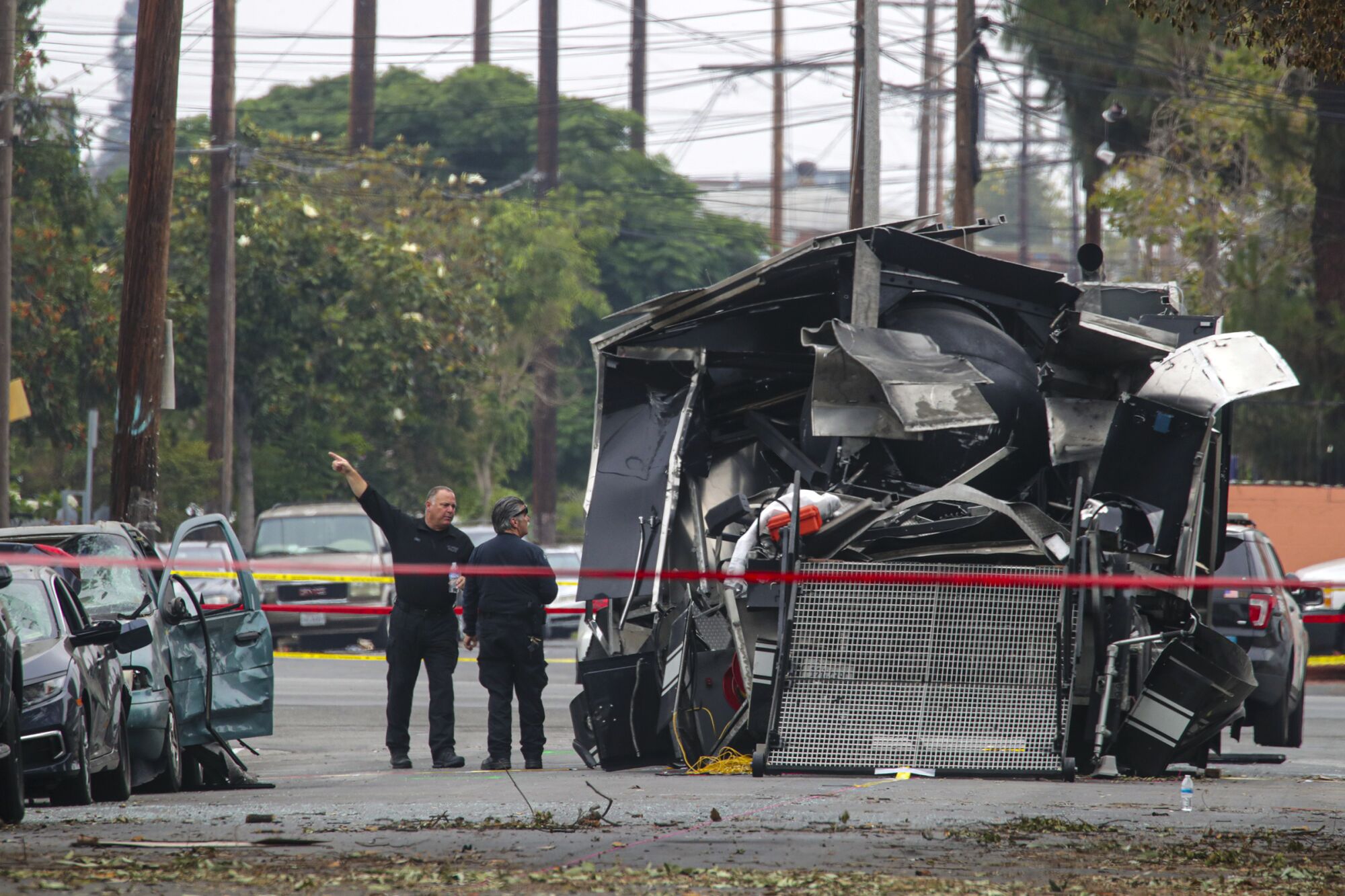 Authorities investigate a fireworks explosion that destroyed an LAPD bomb squad vehicle.