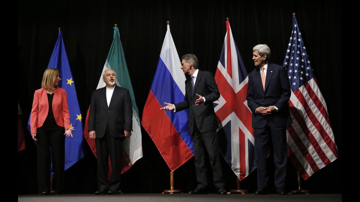Then-Secretary of State John F. Kerry with his foreign counterparts after reaching the 2015 Iran nuclear deal.