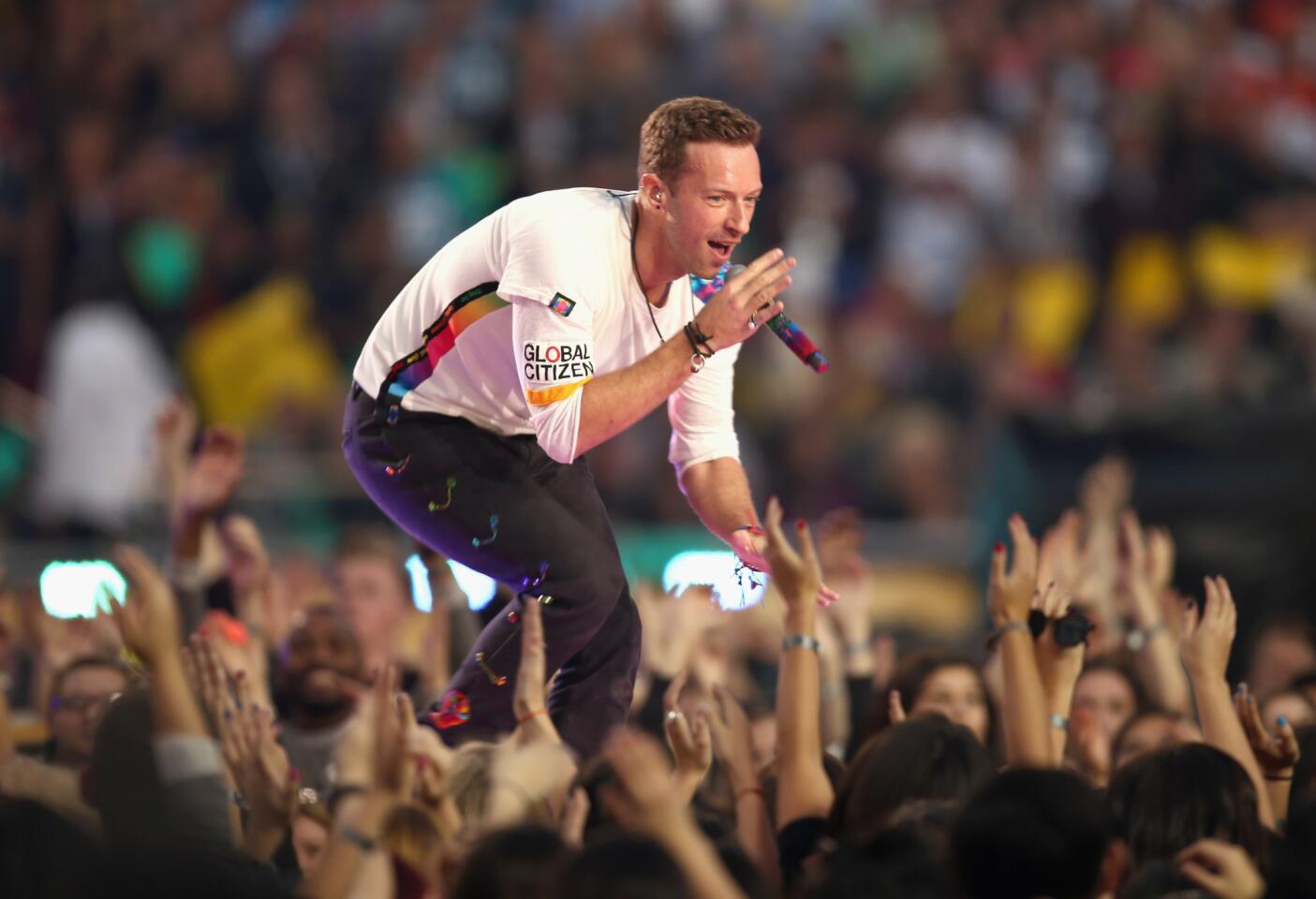 Chris Martin of Coldplay performs during the Super Bowl 50 halftime show at Levi's Stadium in Santa Clara, Calif.