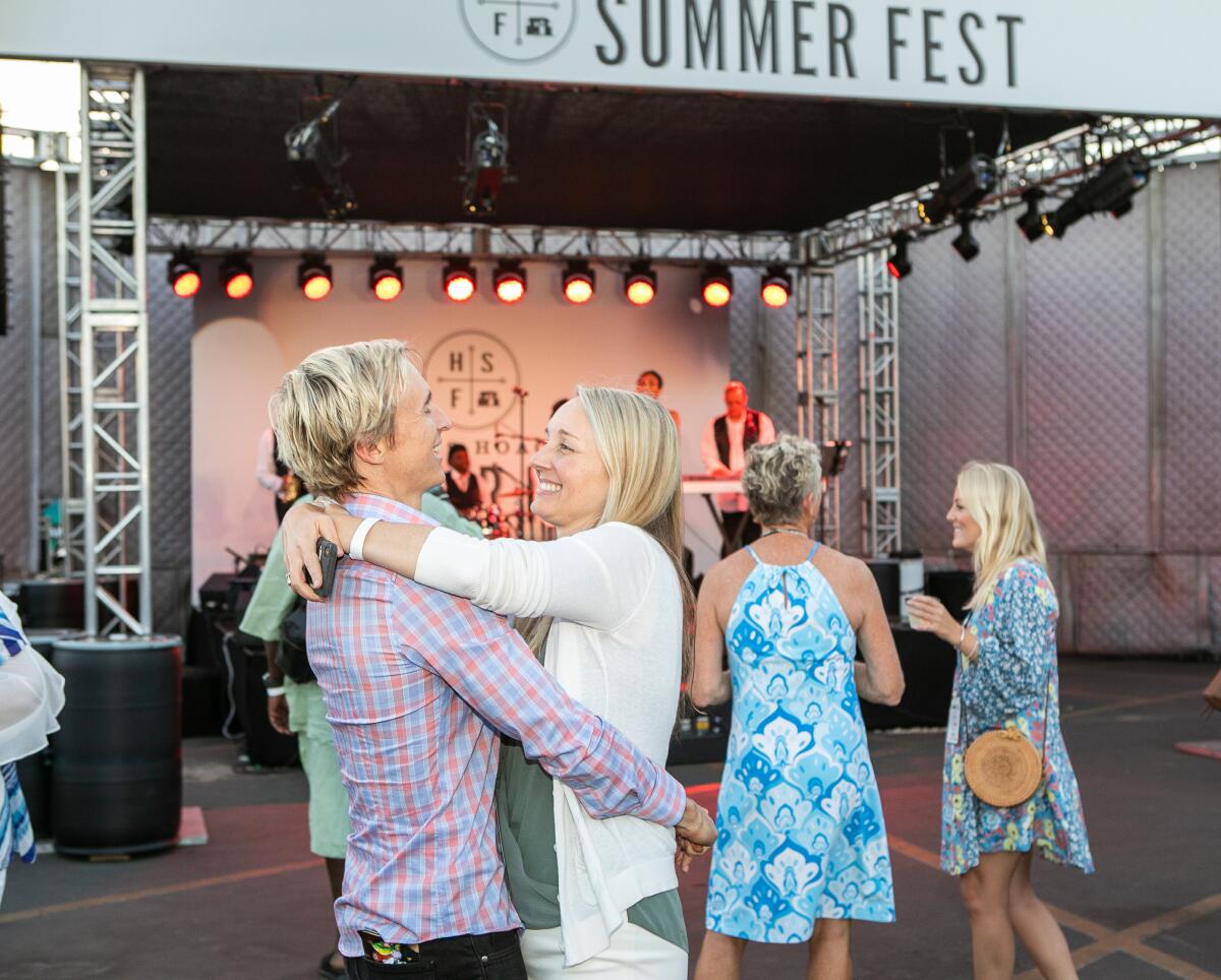 Derek Ostensen and Natalia Olenicoff-Ostensen dance at the Hoag Summer Fest, which raised $225,000 for the Hoag Hospital Foundation in Newport Beach.