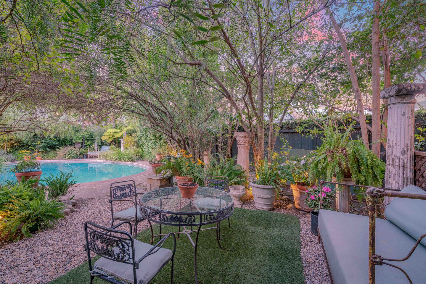 The grounds include a swimming pool.