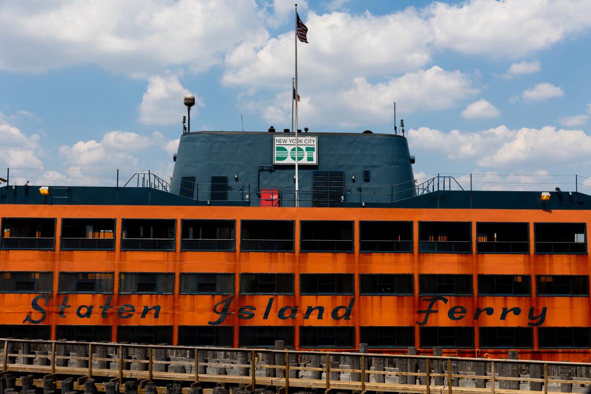A Staten Island Ferry boat at the St. George Terminal, Thursday, Aug. 4, 2022, in the Staten Island borough of New York. (AP Photo/Julia Nikhinson)