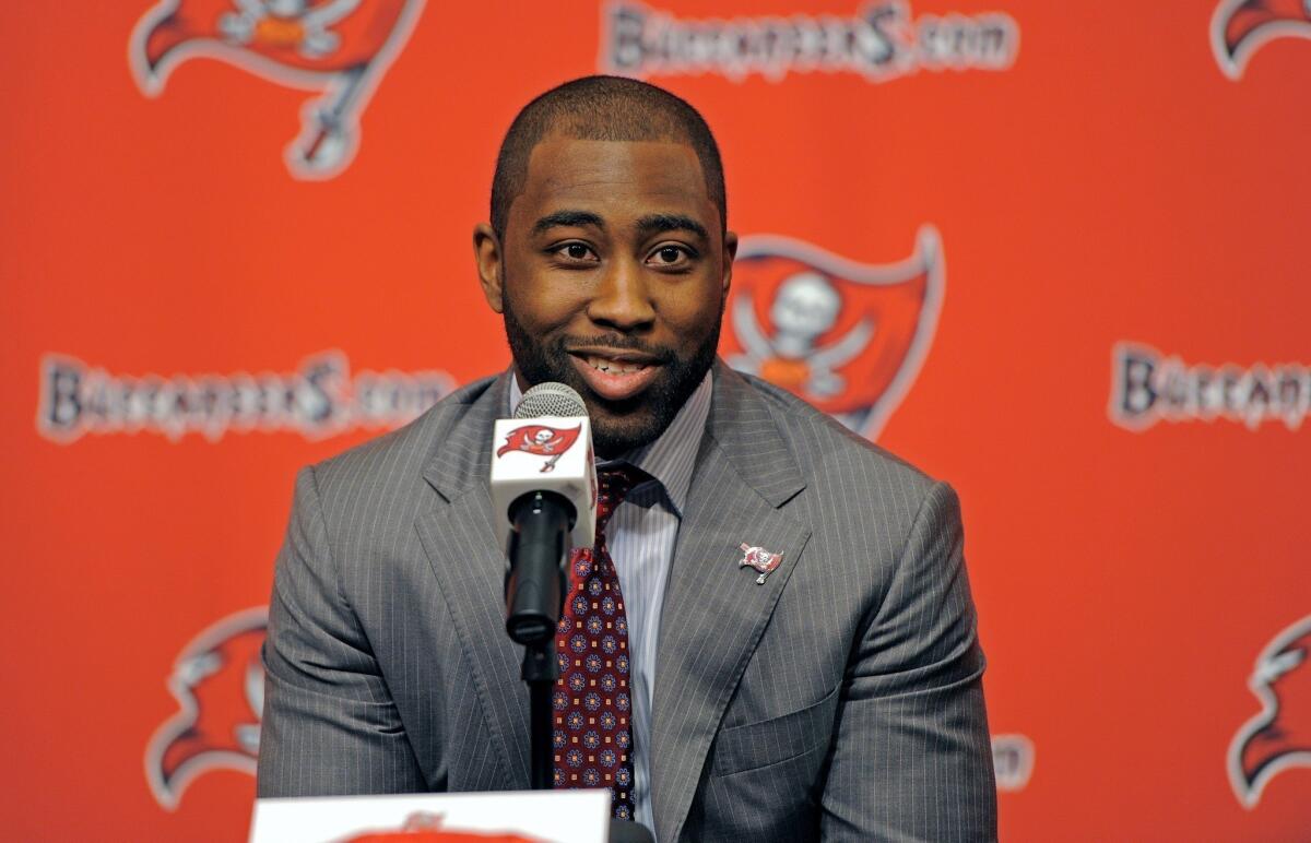 New Buccaneer Darrelle Revis addresses the media in Tampa Bay on Monday.