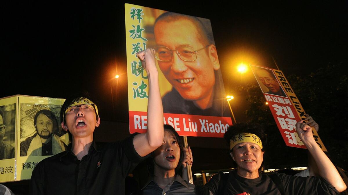 Protestors demonstrate in 2017 to free Liu Xiaobo