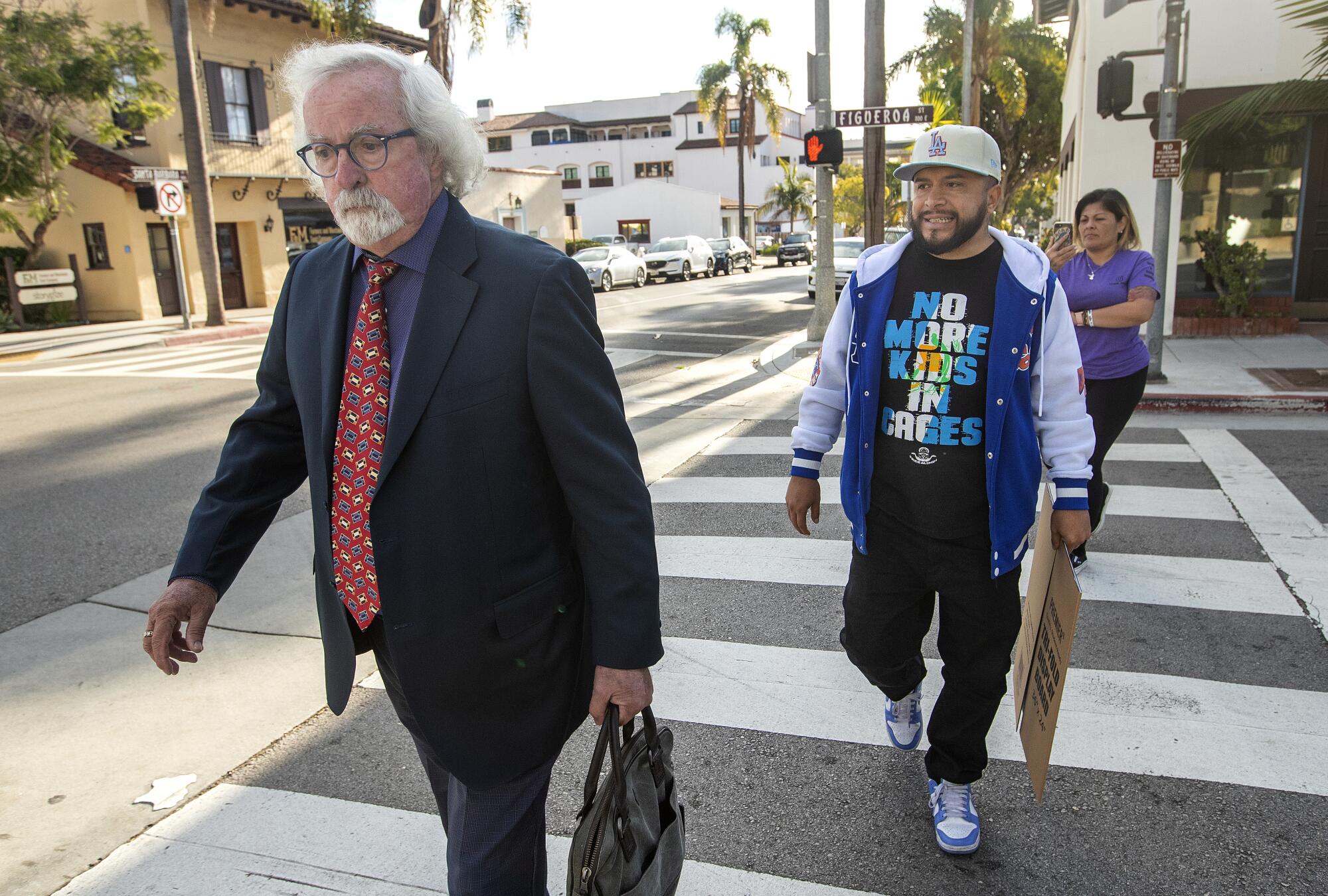 Two men in a crosswalk in Santa Barbara
