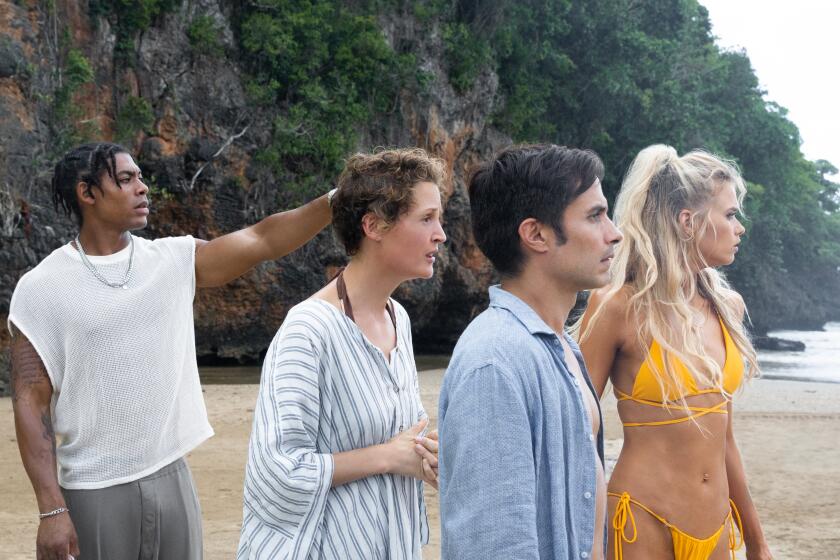 Aaron Pierre, Vicky Krieps, Gael García Bernal and Abbey Lee in the movie "Old."