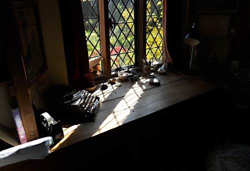 A writing desk in the South Cottage at Sissinghurst. Sissinghurst Castle Garden is in the tiny village of Sissinghurst in Kent, England, about 50 miles southeast of London.