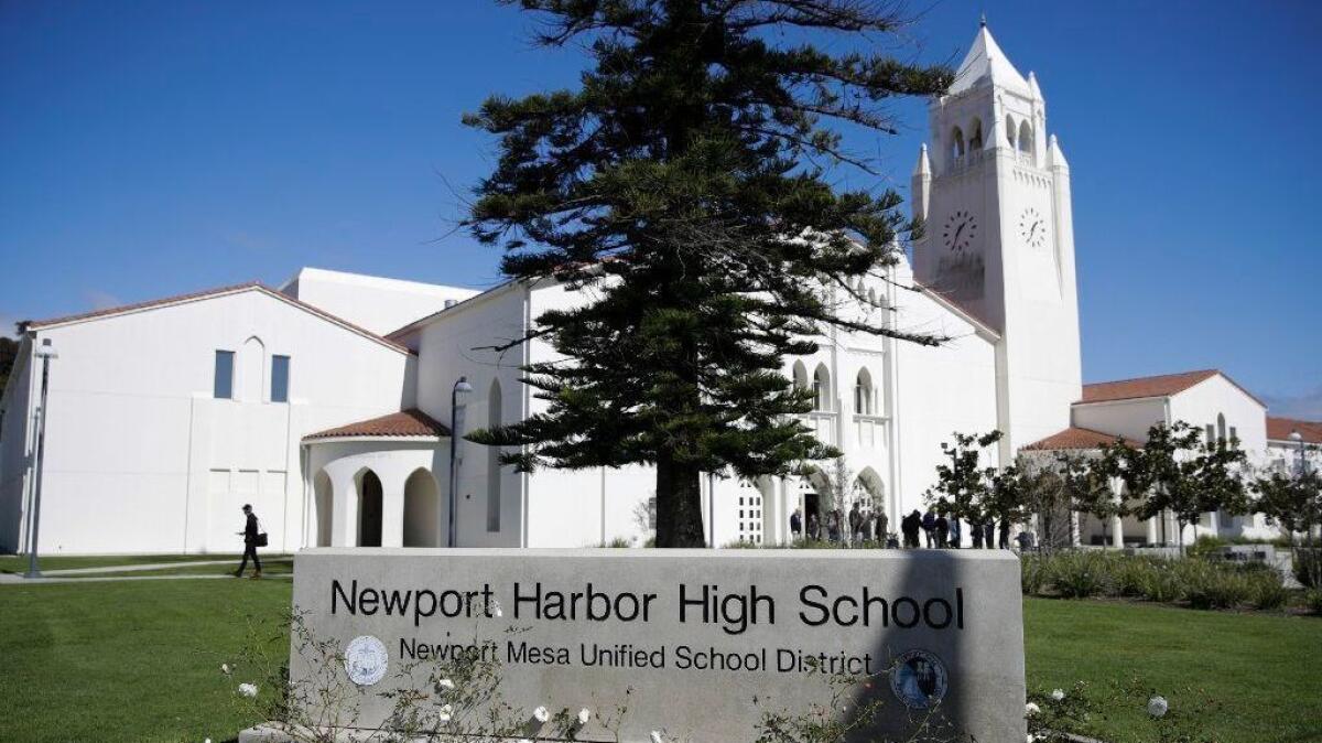 A group of students from Newport Harbor High School in Newport Beach, pictured above, were photographed giving Nazi salutes around a swastika made out of red cups at a house party.