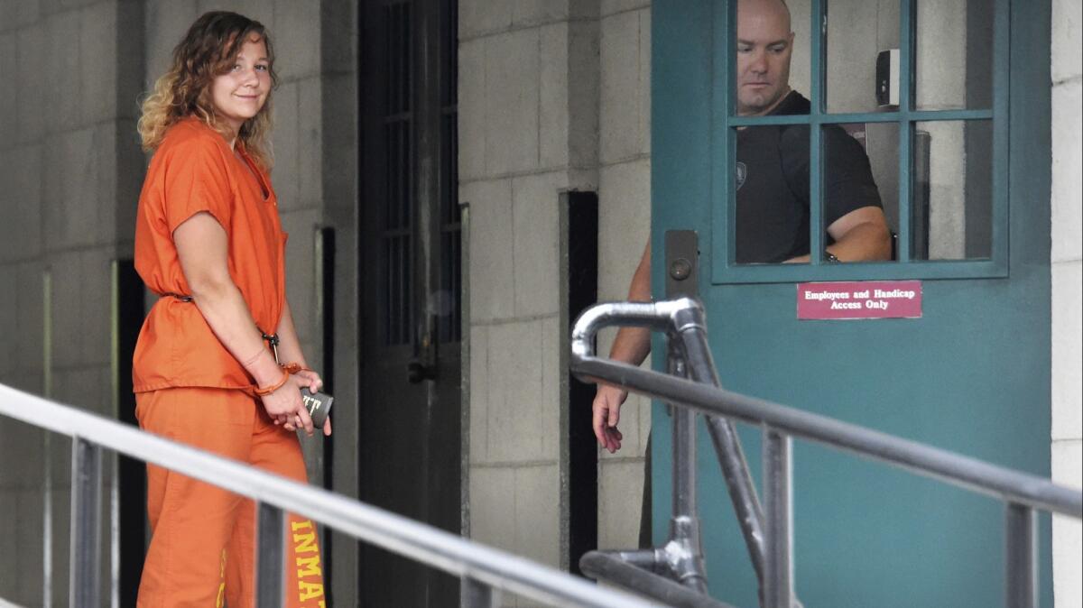 Reality Winner arrives at a courthouse in Augusta, Ga. on Aug. 23, after she pleaded guilty in June to copying a classified U.S. report and mailing it to an unidentified news organization.