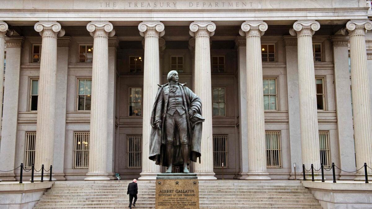 A statue of Alexander Hamilton stands outside the U.S. Treasury Department building in Washington, D.C.