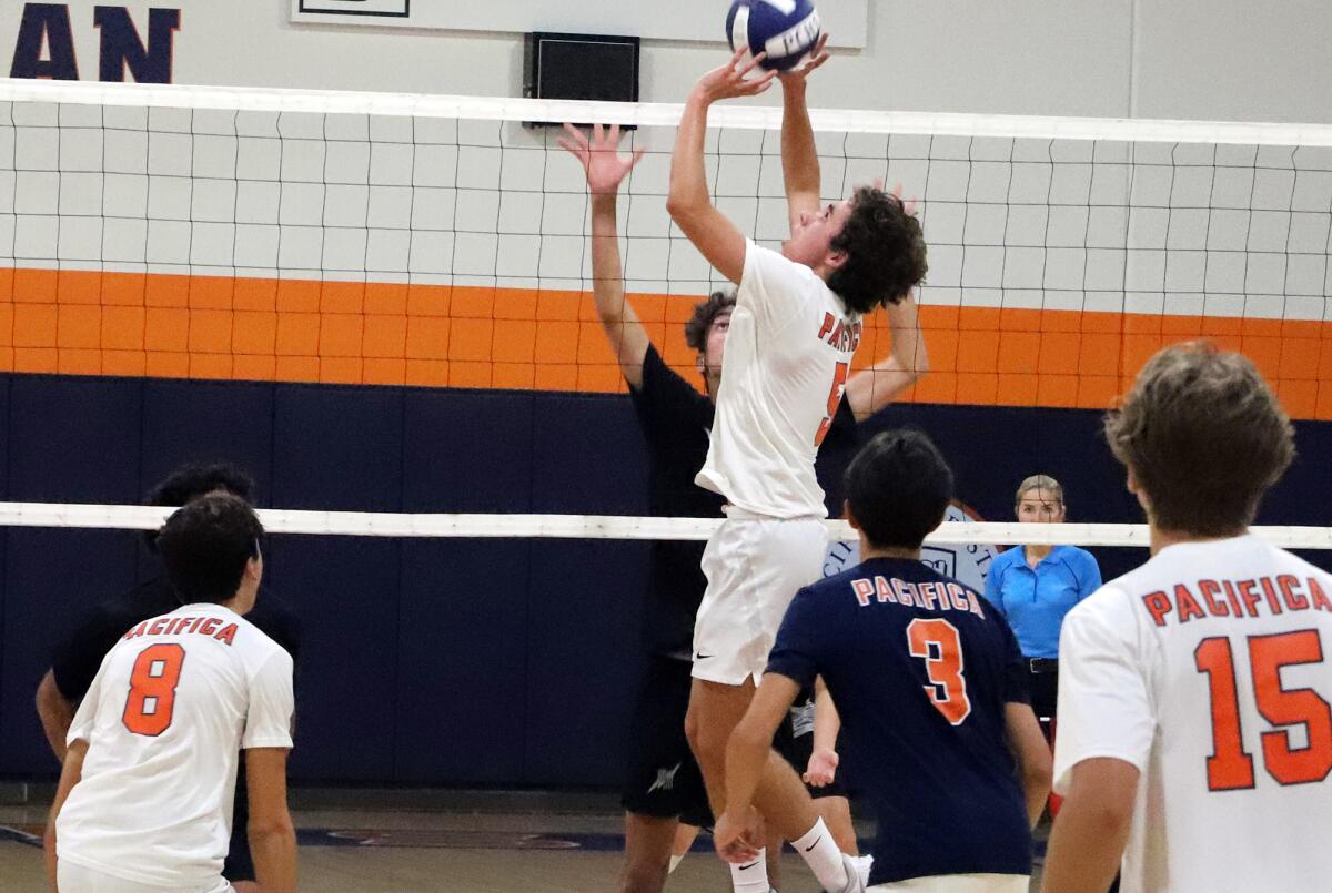 Pacifica Christian's Callen Bray (5) sets up Kallai Kumar (8) for a kill against Sage Hill on Friday.