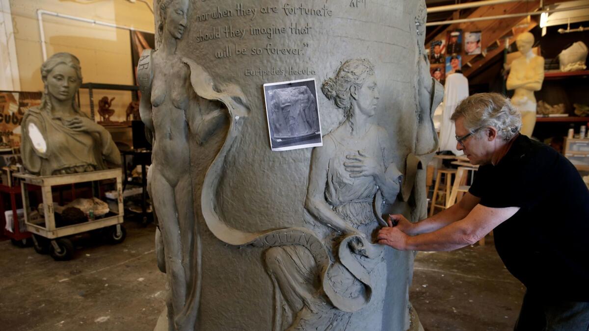 Christopher Slatoff works on the sculpture at his studio in Los Angeles.