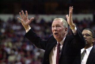 Coach Steve Fisher reacts to an officials call during the game against UNLV on Thu, Mar 07, 2002. Photo by Earnie Grafton/UT