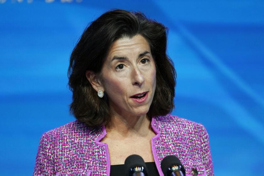 FILE - In this Jan. 8, 2021 file photo, President-elect Joe Biden's nominee for Secretary of Commerce, Rhode Island Gov. Gina Raimondo speaks during an event at The Queen theater in Wilmington. The Senate has voted to confirm Raimondo as President Biden's commerce secretary. (AP Photo/Susan Walsh)