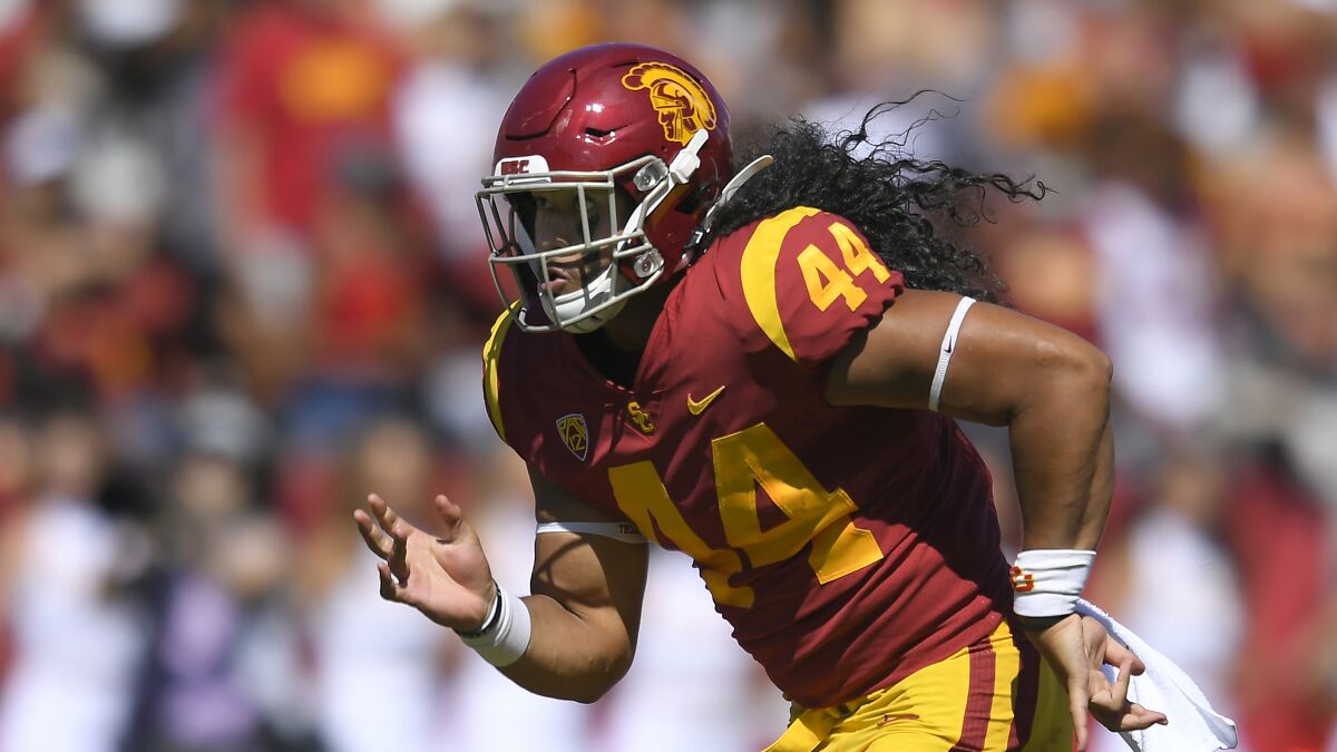 USC Trojans linebacker Tuasivi Nomura chases after a play during a game against San Jose State in September 2021.