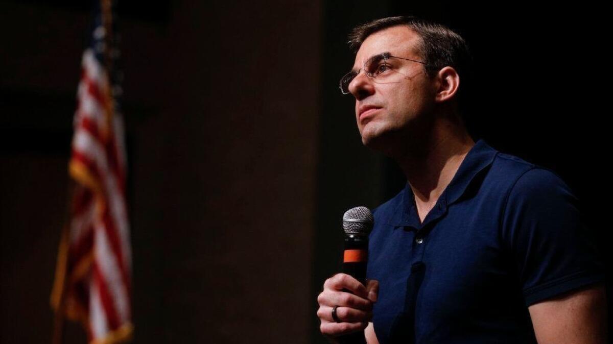 Rep. Justin Amash (R-Mich.) holds a town hall meeting in Grand Rapids on May 28.