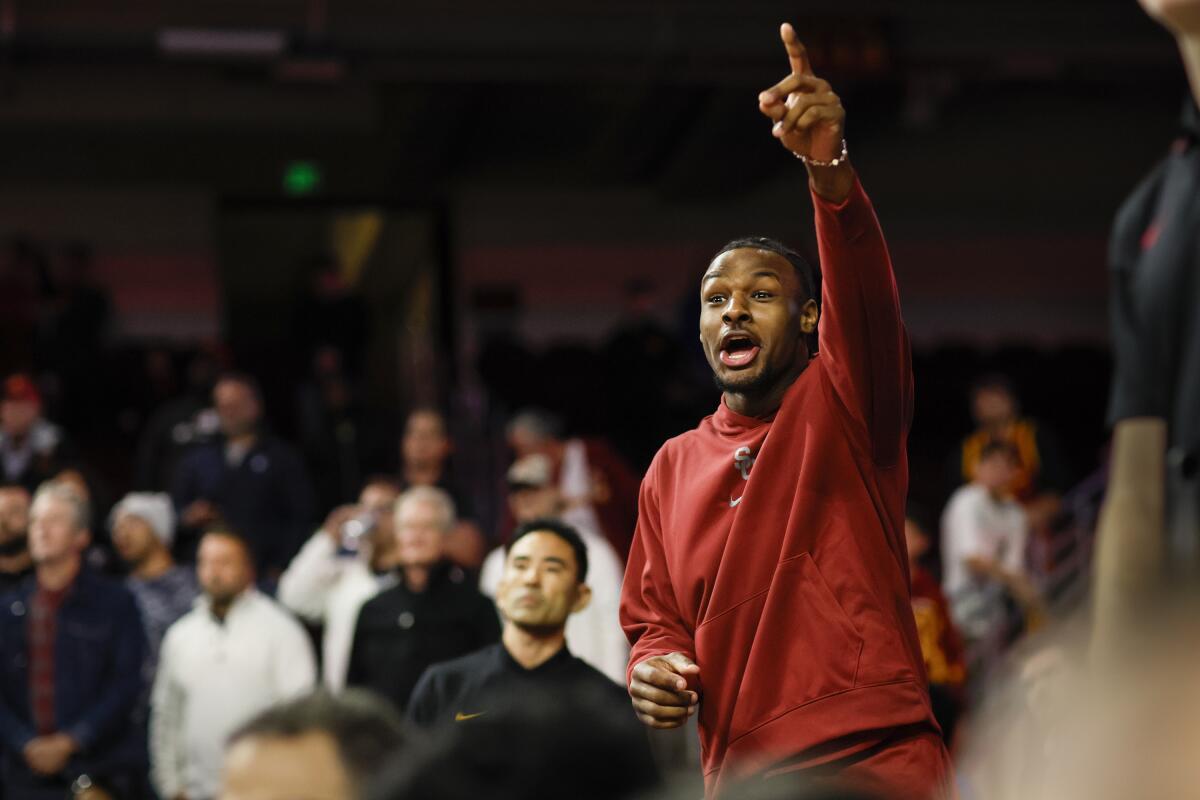 Bronny James cheers during a game between USC and Eastern Washington at Galen Center on Nov. 29.