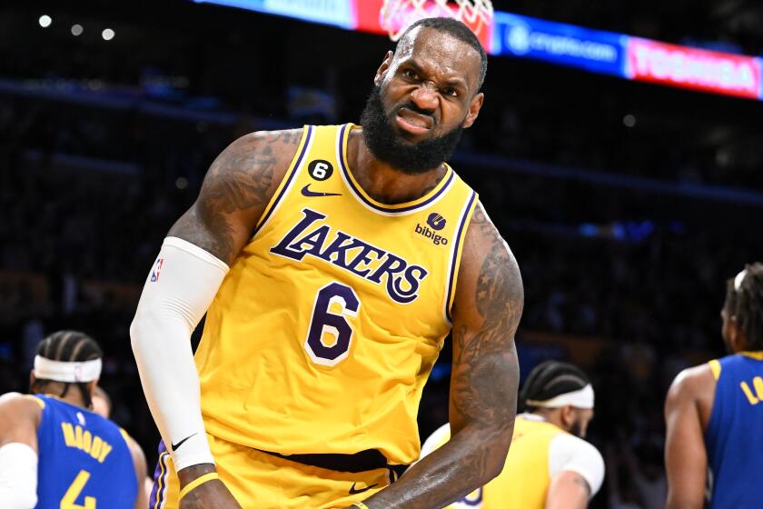 Los Angeles, California May 12, 2023-Lakers LeBron James celebrates his basket against the Warriors.
