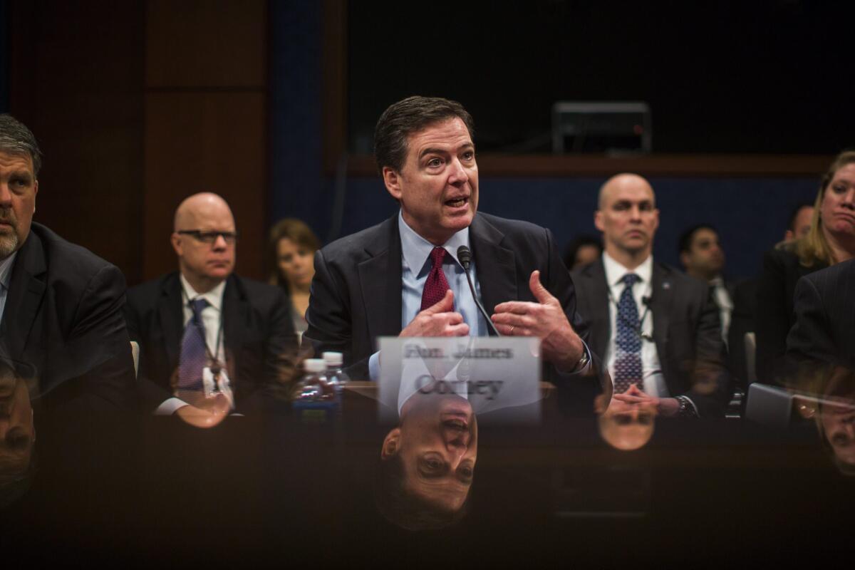 FBI Director James Comey speaks during a hearing before the House Select Intelligence Committee on Feb. 25.