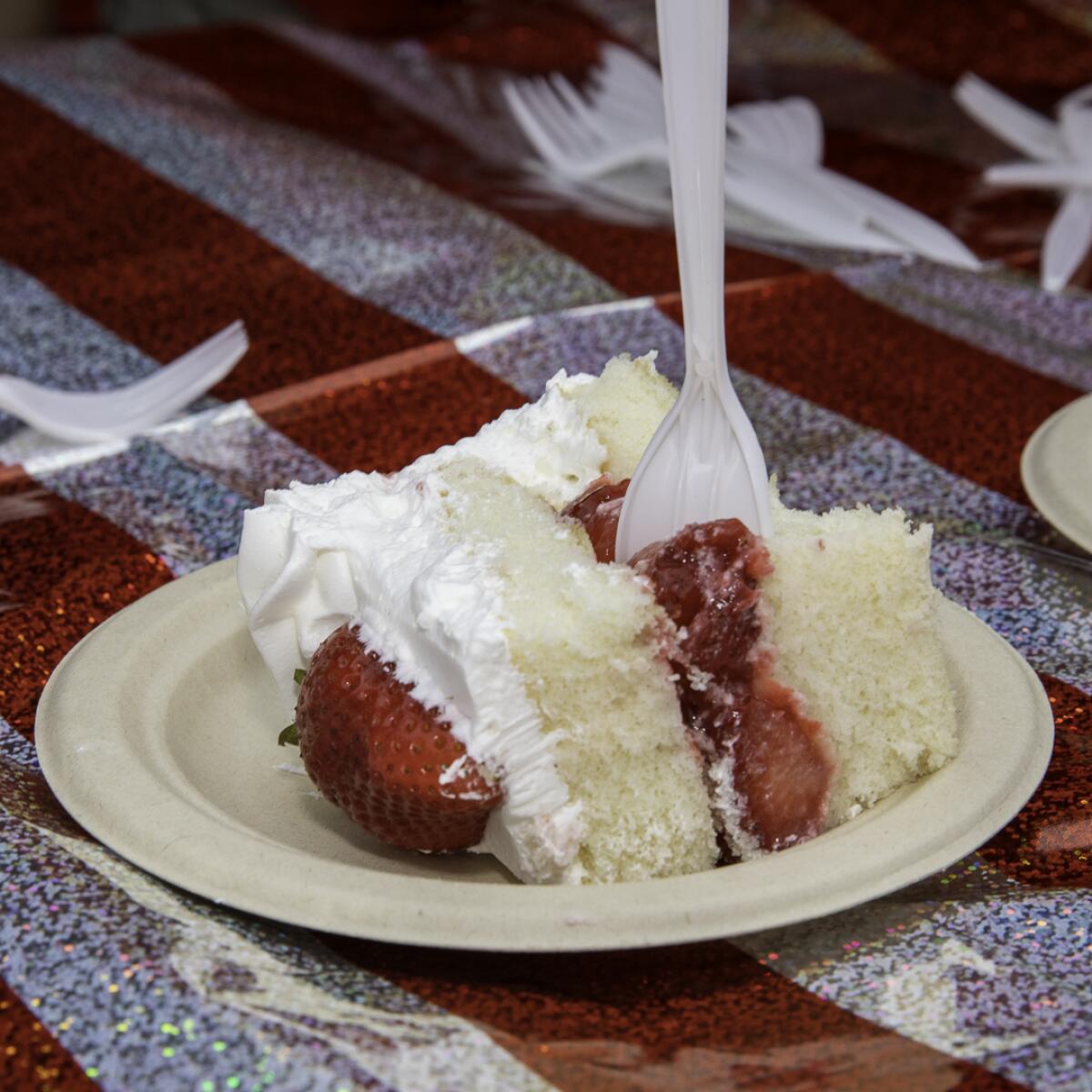 The annual strawberry cake cutting is a tradition dating back to the early Strawberry festivals.