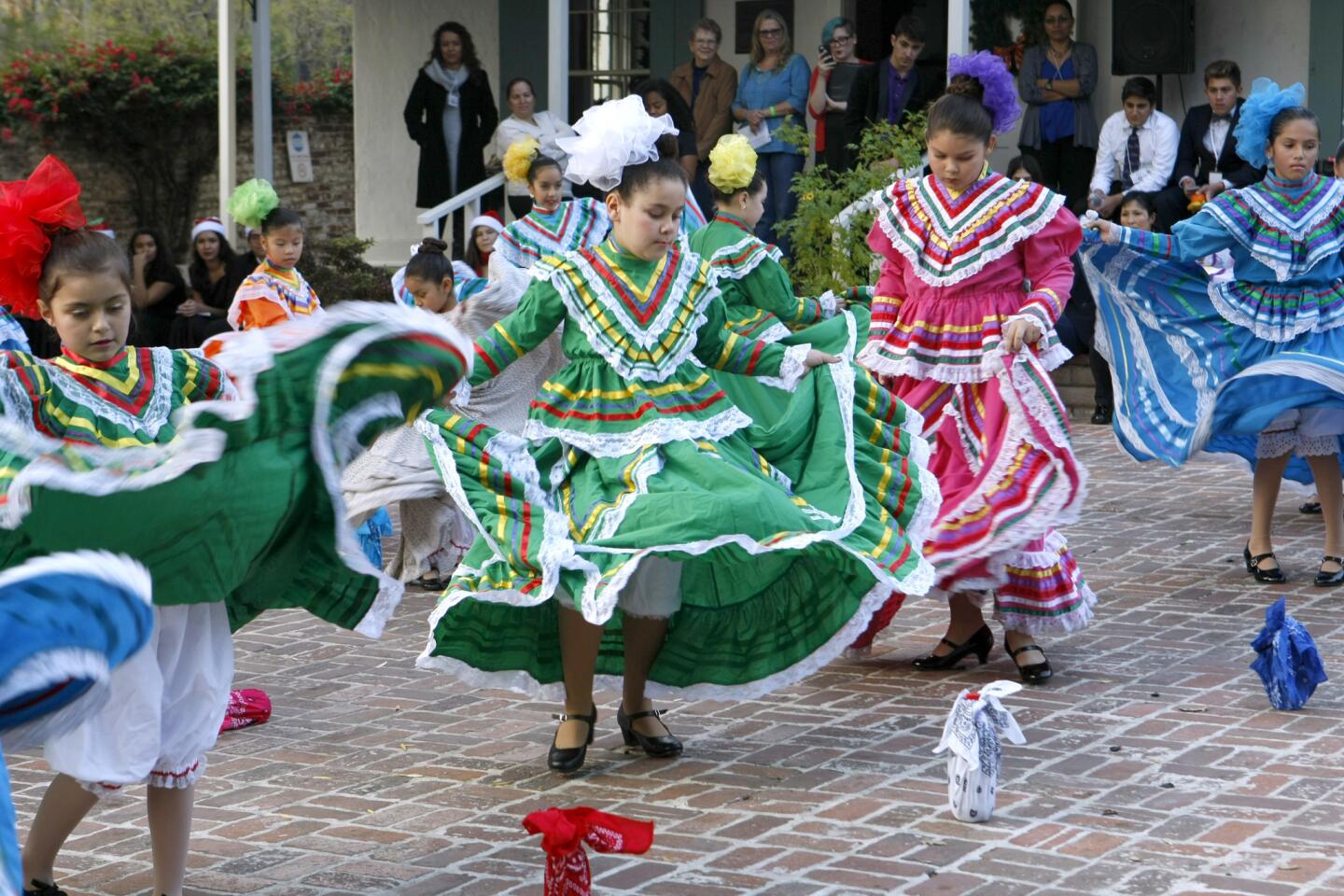 The Balet Folklorico Horace Mann, from Horace Mann Elementary School, performed for crowds gathered at the Fiesta De Las Luminarias, at Casa Adobe de San Rafael, in Glendale on Saturday, Dec. 10, 2016.