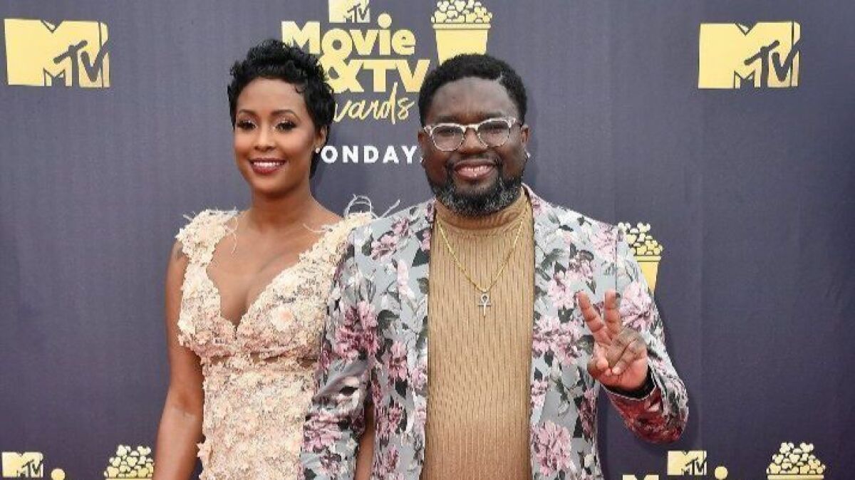 Lil Rel Howery and guest attend the 2018 MTV Movie And TV Awards.