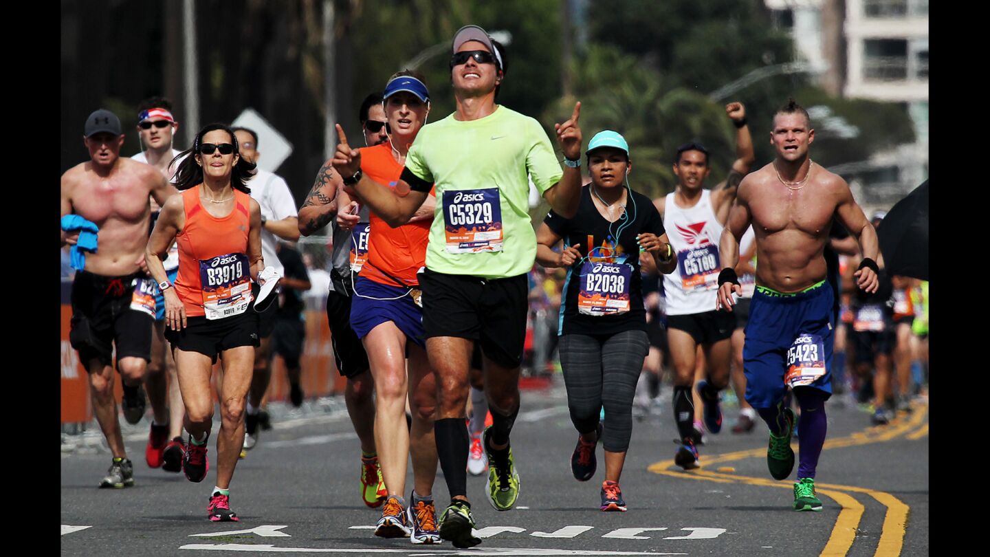 L.A. Marathon Kenyans win; dozens hospitalized in stifling heat Los