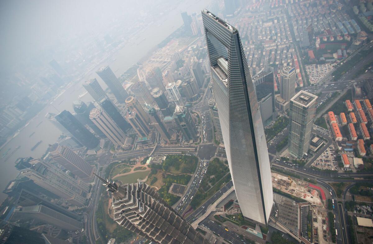 The Shanghai World Financial Center is 1,622 feet tall, has 101 floors and was completed in 2008.