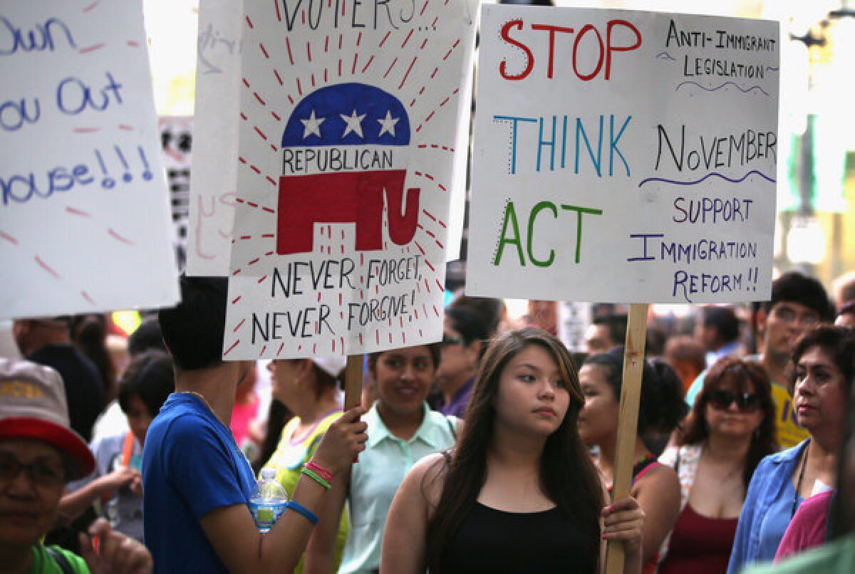 Protestors demonstrate for immigration reform in front of the Illinois GOP headquarters in Chicago.