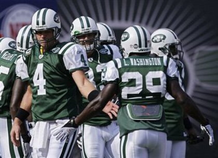Quarterback Brett Favre, left, and his Jets teammates will present a challenge for the Charger pass defense, which is off to a slow start this season. AP Photo/Julie Jacobson