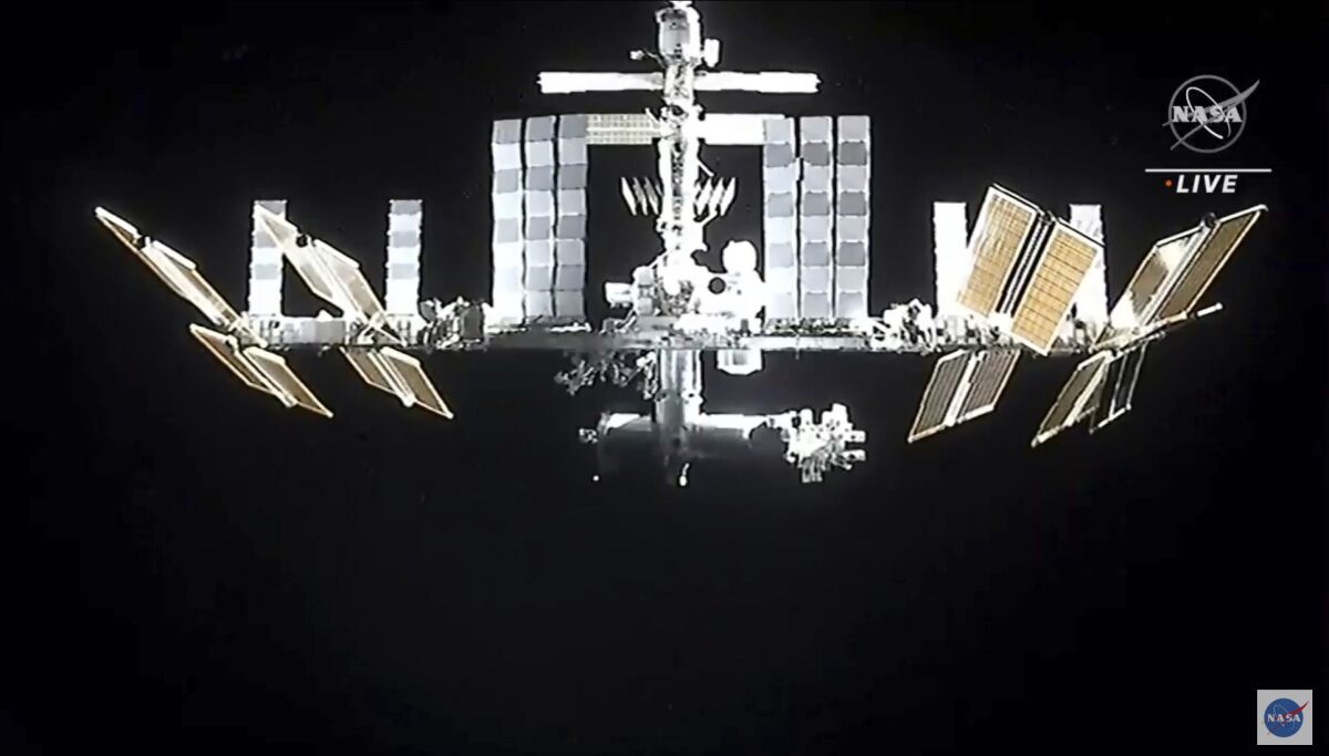 In this image from video provided by NASA, the International Space Station is seen as astronauts in the SpaceX Dragon capsule undock on Monday, Nov. 8, 2021, (NASA via AP)