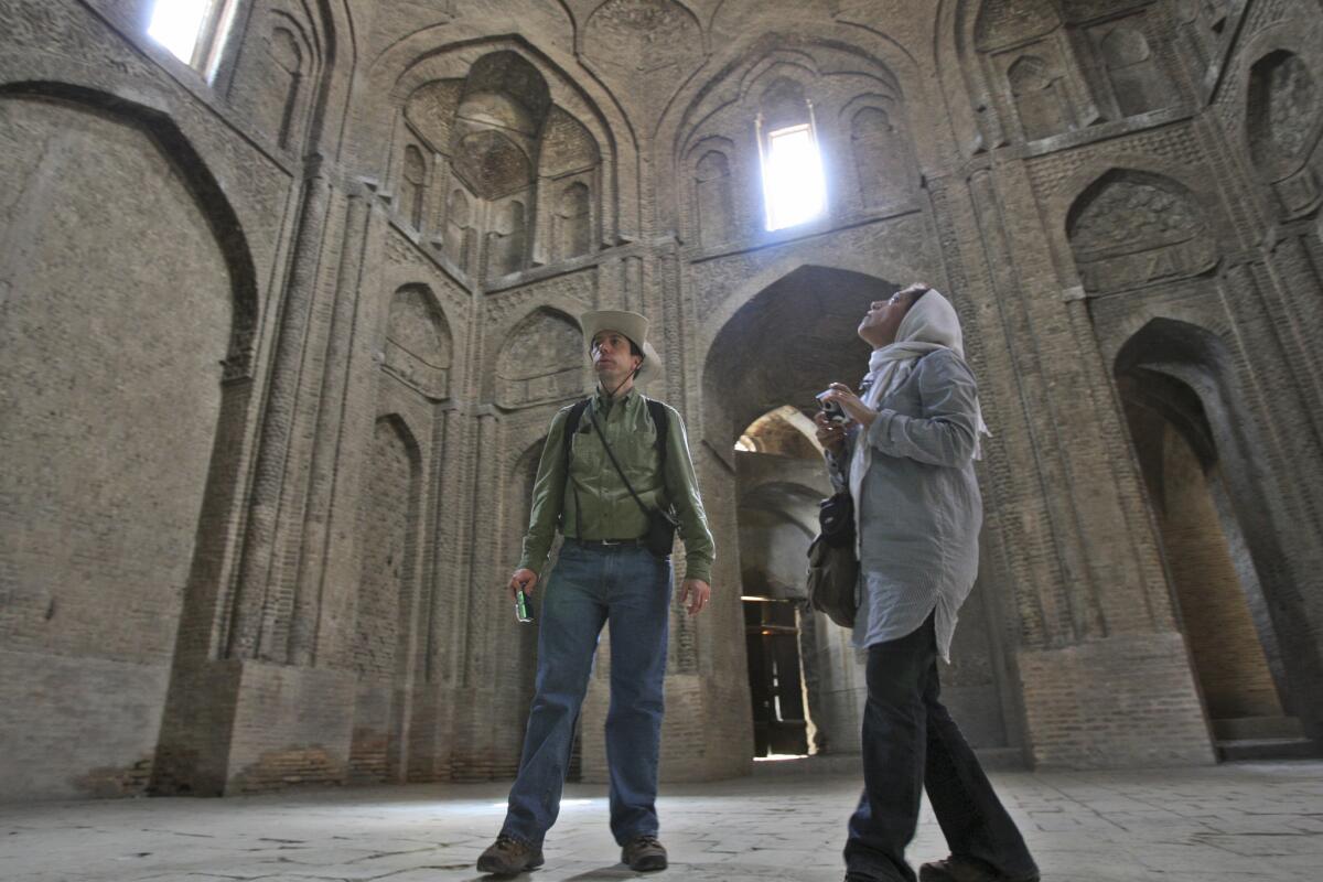 Tourists in 2011 visit the Iranian city of Isfahan, about 230 miles south of Tehran. 
