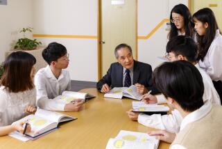 Taiwan-Burn Lin with his students. Burn Lin led technological breakthroughs at Taiwan Semiconductor Manufacturing Company, today the crown jewel of Taiwan's tech industry. (Courtesy Burn Lin)