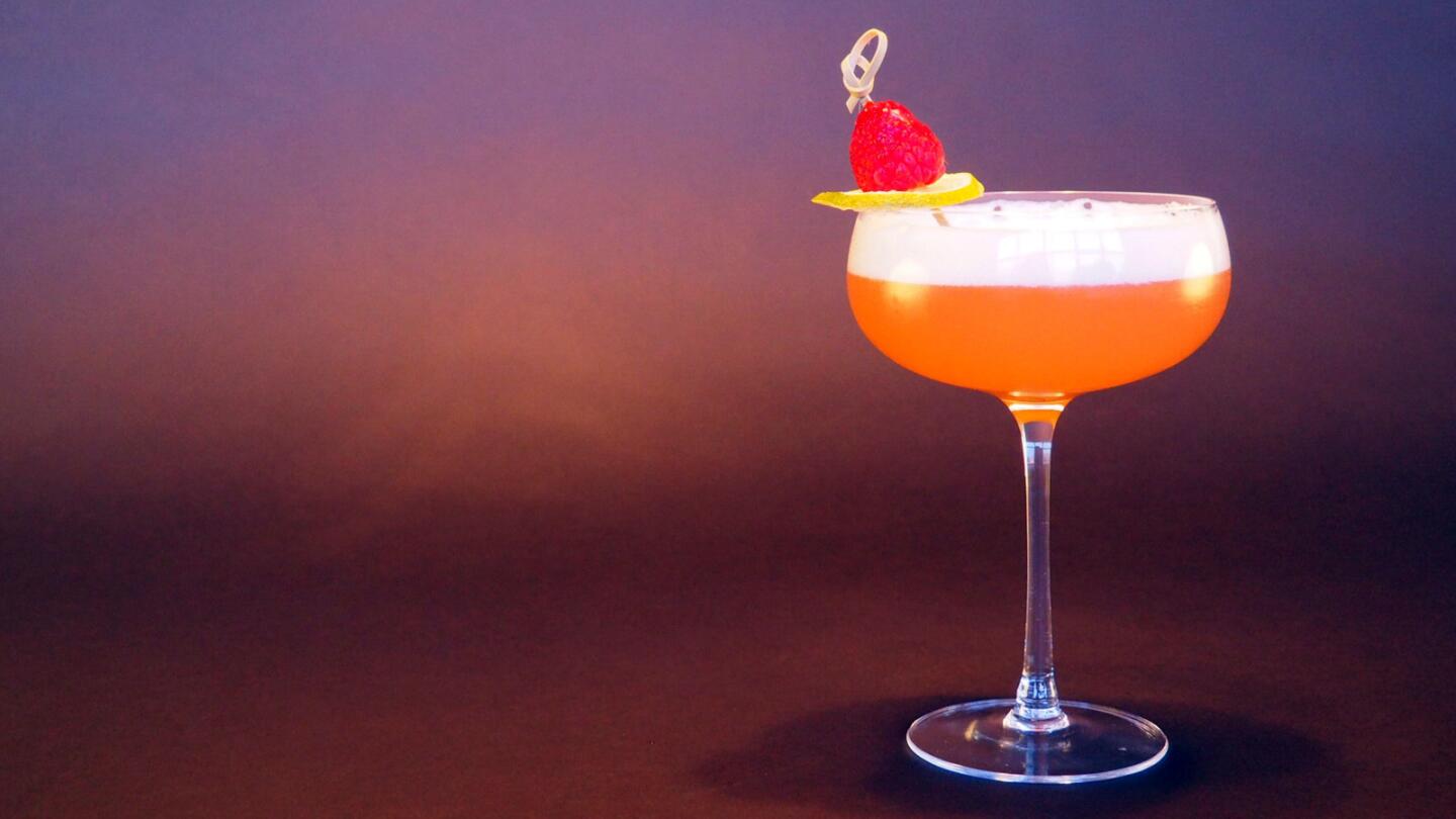 The Climbin' High is made with Encanto pisco, Appleton VX rum, raspberries, fresh pineapple and lime juices and Alain Ducasse Champagne.