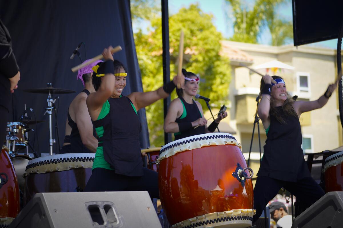 Naruwan Taiko plays traditional Japanese drums during a performance at She Fest San Diego on Saturday.