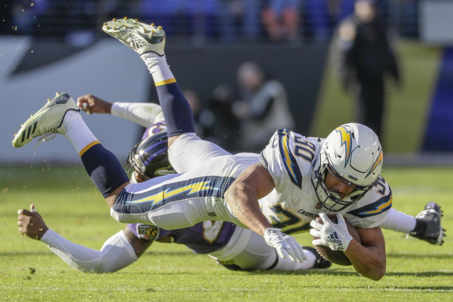 Chargers running back Austin Ekeler is tripped up for a three-yard reception during a second-quarter drive.