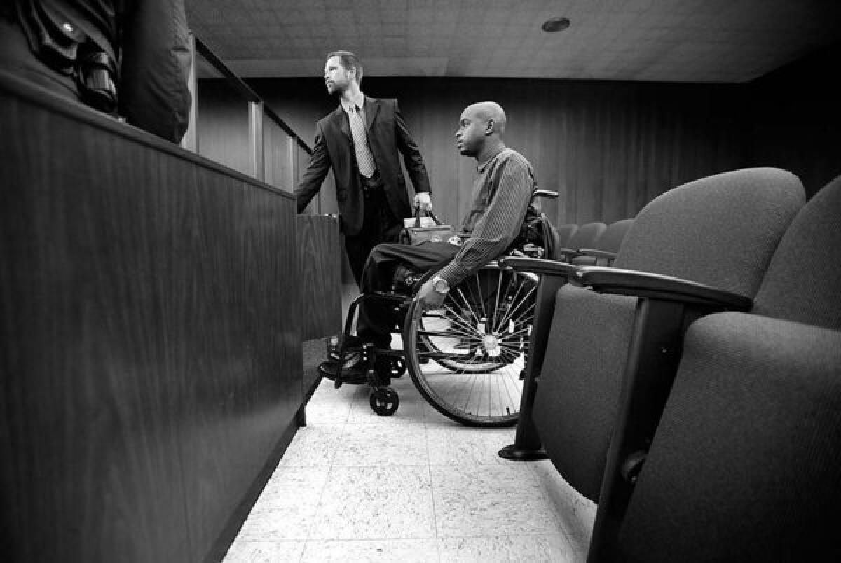 Davien prepares to testify against Santana. Los Angeles County Sheriff's Det. Scott Schulze, lead investigator in the case, whom he had come to trust, escorts him into court. Three years before, sheriff's investigators had placed Davien in protective custody after they intercepted threats against him at the county jail.