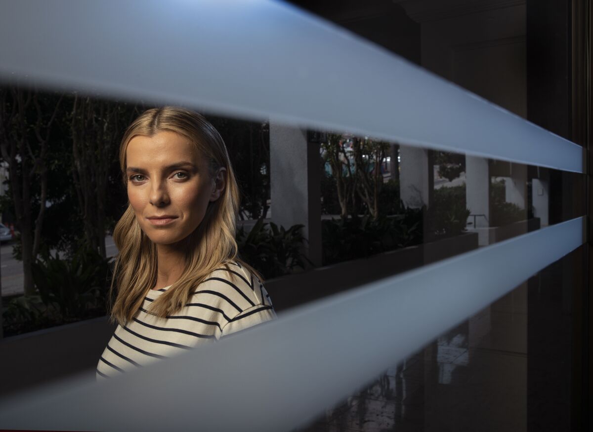Betty Gilpin of TV's "GLOW" makes a big screen star turn in action-satire "The Hunt" -- a film whose tumultuous release has been interrupted by controversy, cancellation and now, the COVID-19 pandemic. 