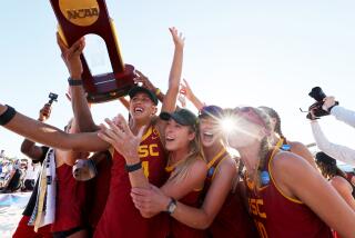 GULF SHORES, AL - MAY 08:The USC Trojans celebrate their victory against the Florida State Seminoles during the Division I Womens Beach Volleyball Championship held on May 8, 2022 in Gulf Shores, Alabama. (Photo by Jamie Schwaberow/NCAA Photos via Getty Images)