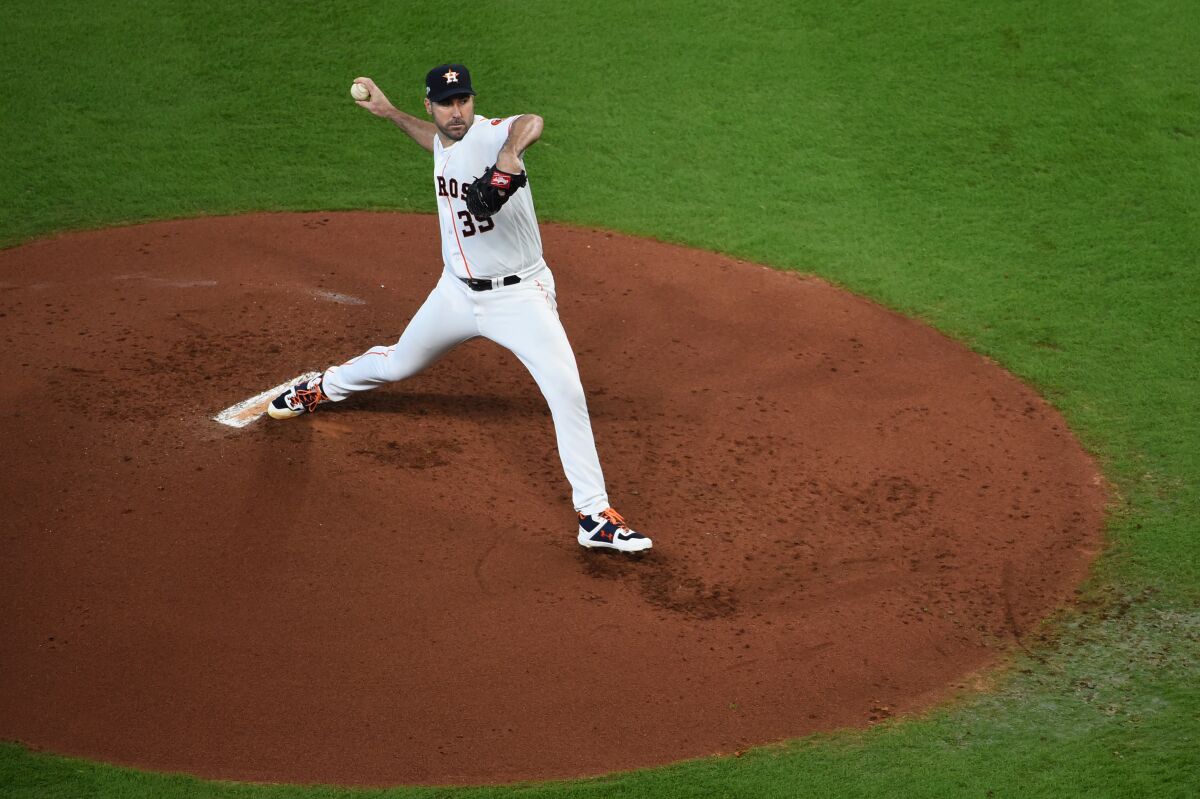 Houston Astros starter Justin Verlander delivers against the Tampa Bay Rays in Game 1 of the American League Division Series on Friday.