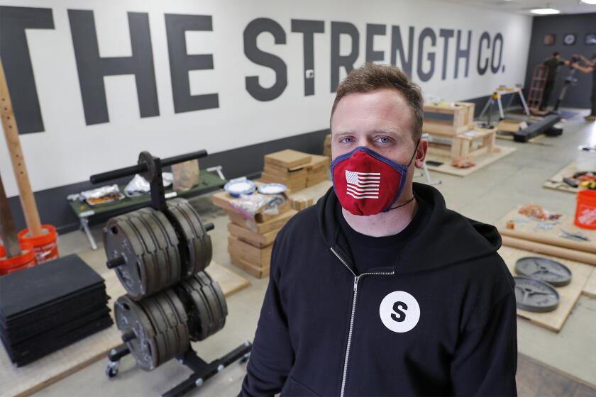 Grant Broggi, The Strength Company owner, closed his strength training gym and began manufacturing his own wooden and steel squat racks to sell to people so they could workout at home.