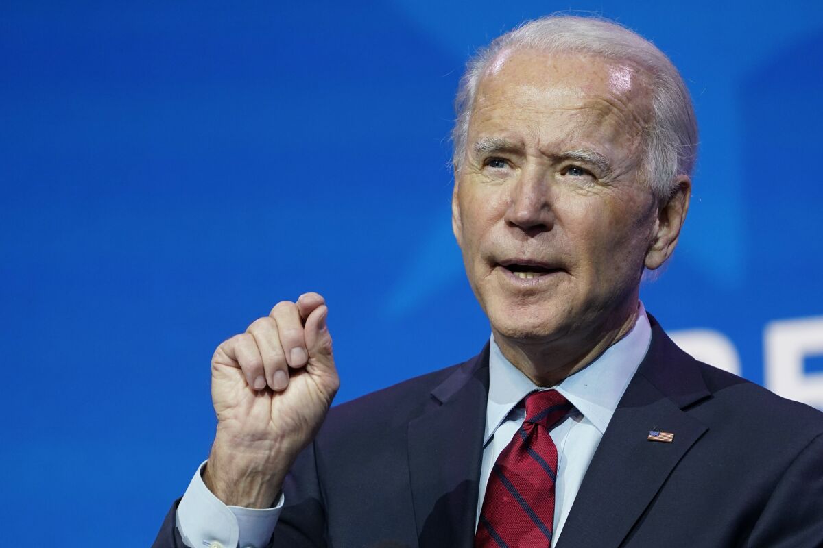 President-elect Joe Biden speaks during an event at The Queen theater in Wilmington, Del., Tuesday, Dec. 8, 2020, to announce his health care team. (AP Photo/Susan Walsh)