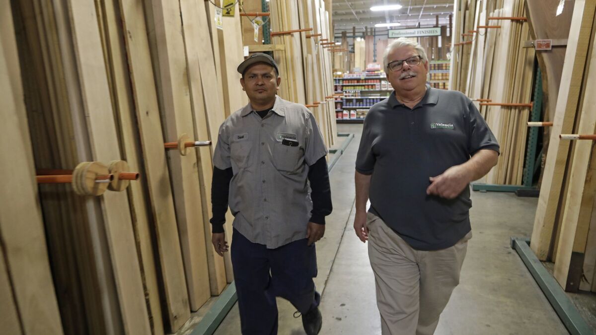 David Acevedo, left, and Kevin Kelley at Valencia Lumber and Panel in Van Nuys.
