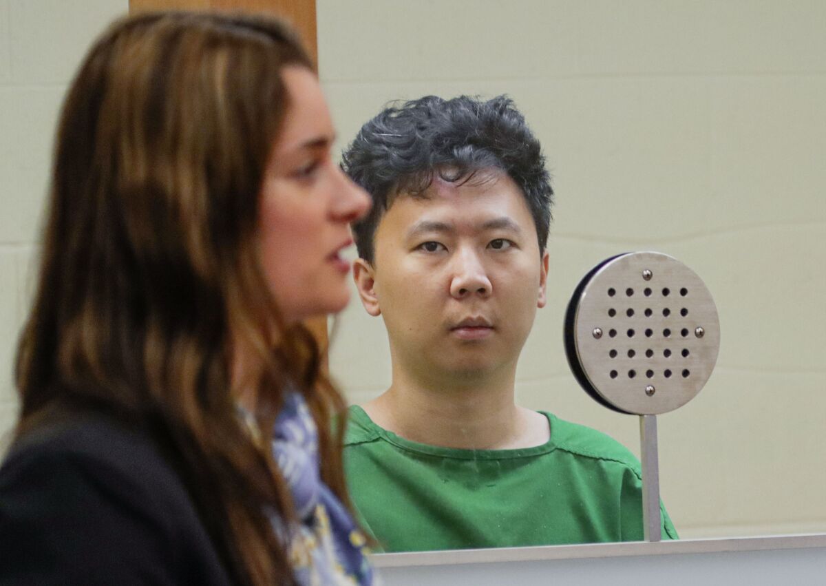 Yuhao Du listens as his attorney Anna Demidchik speaks during his arraignment