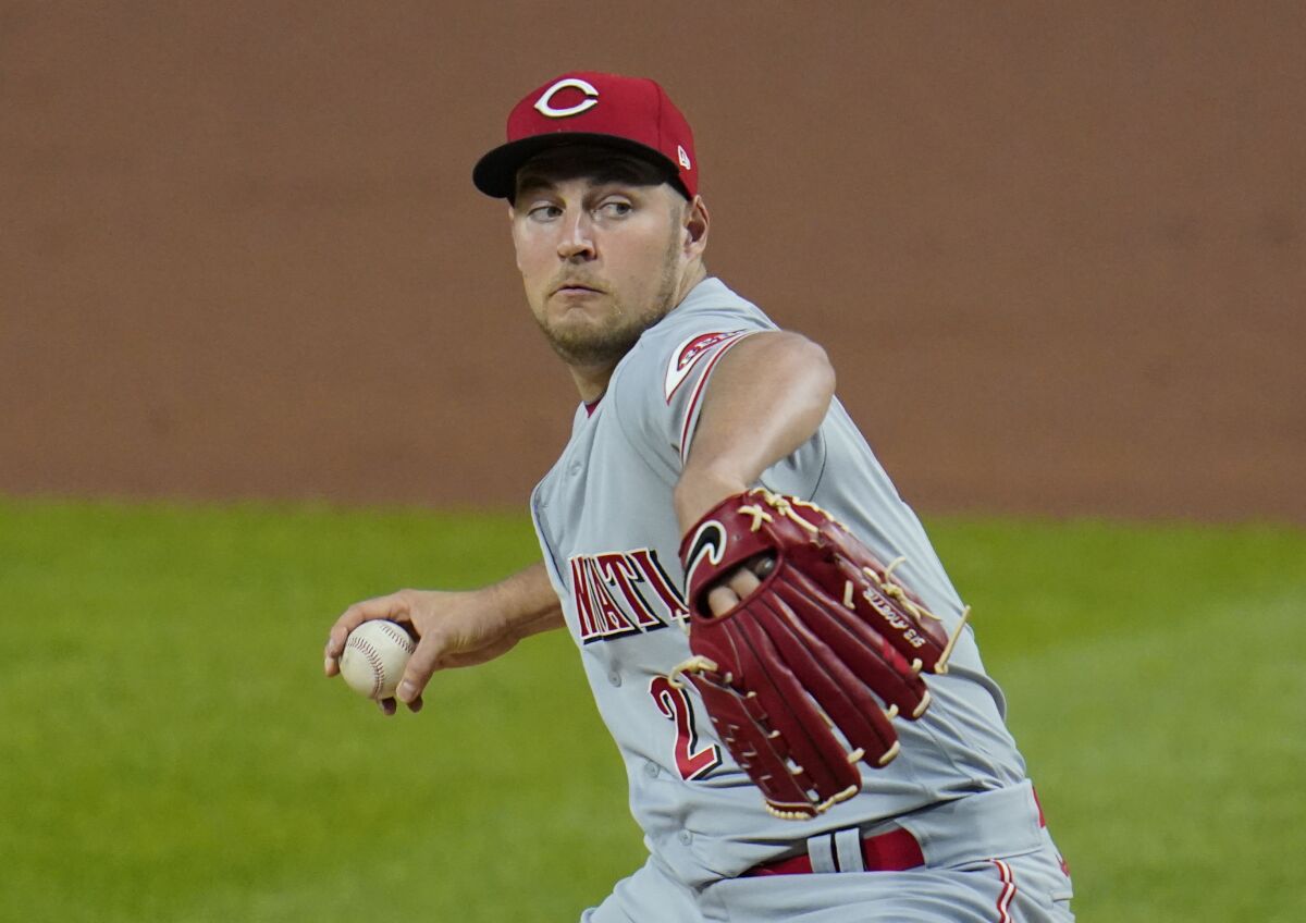 Former Cincinnati Reds starting pitcher Trevor Bauer agreed to a three-year deal with the Dodgers on Friday.