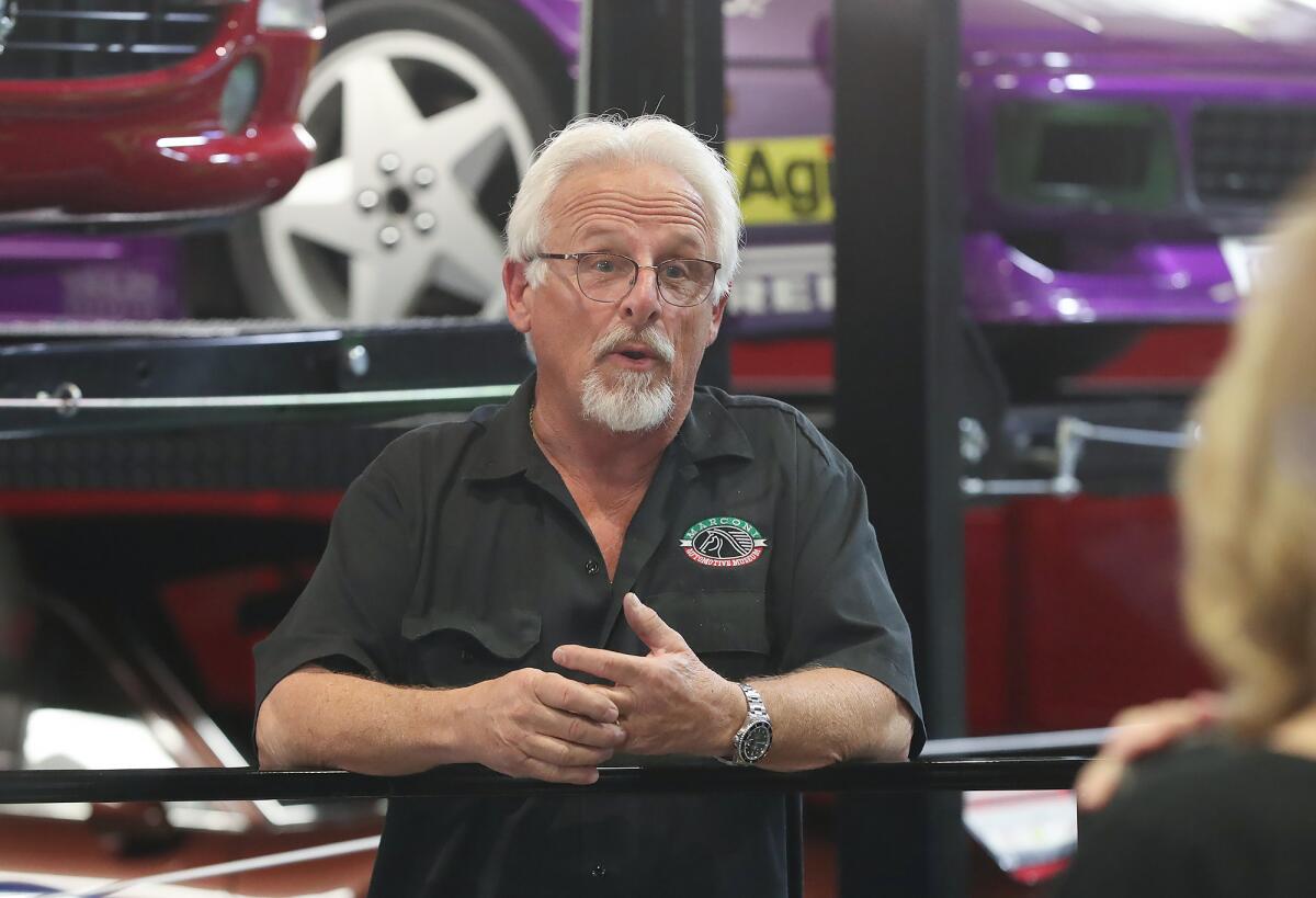 John Marconi speaks during a tour Tuesday at the Marconi Automotive Museum in Tustin.