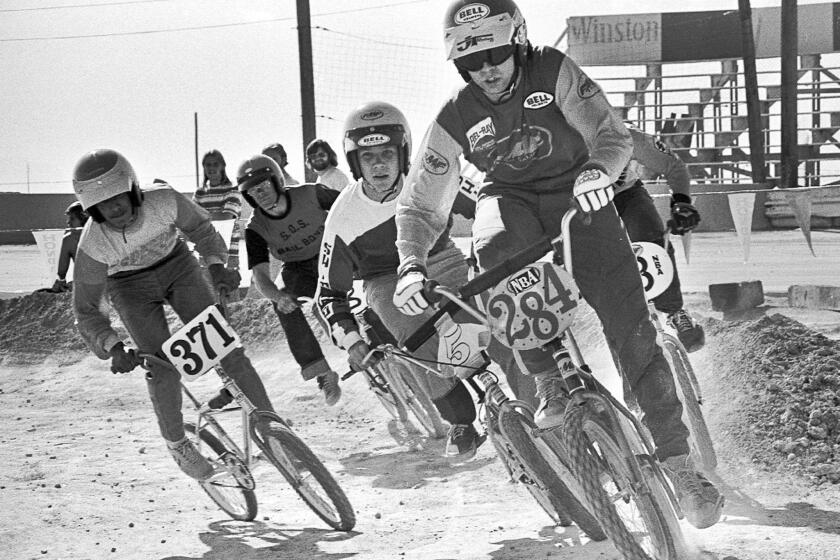 Scot Breithaupt leads the pack in a BMX bicycle race in Las Vegas in 1976. Breithaupt organized races on dirt motorcycle courses in the early 1970s and founded BMX. In 2008, the sport debuted in the Olympics in Beijing.
