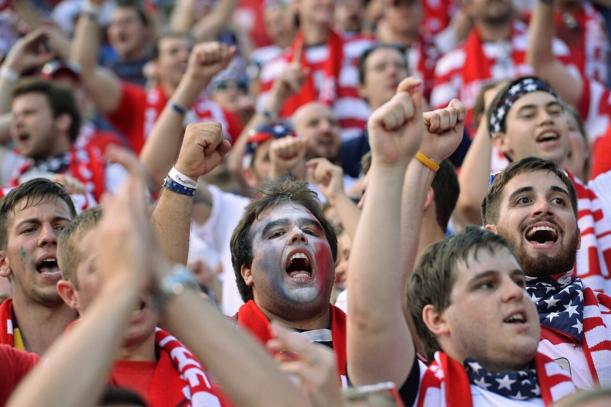 Fans cheer during Tuesday's World Cup qualifying match between the United States and Mexico.